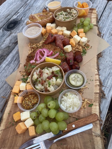 Share platter at Lotawana Brewing outdoor tables